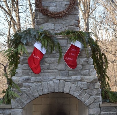 Winter architecture decor on an outdoor fireplace.
