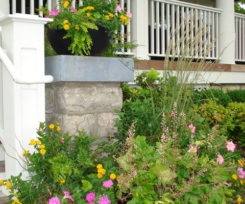 Accent flower pots near a home entryway